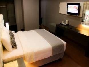 Imagen de la habitación del Hotel The Rizen Cisarua. Foto 2