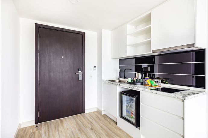 Imagen de la habitación del Hotel The Rizin Hotel & Residences. Foto 7