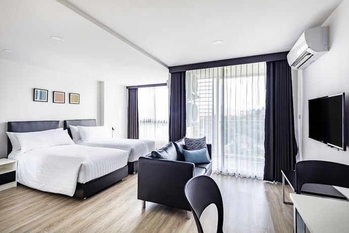 Imagen de la habitación del Hotel The Rizin Hotel & Residences. Foto 8