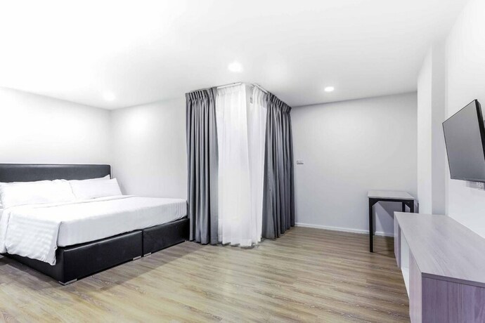Imagen de la habitación del Hotel The Rizin Phratumnak. Foto 5
