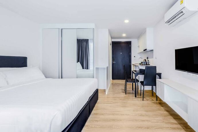 Imagen de la habitación del Hotel The Rizin Phratumnak. Foto 8
