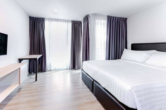 Imagen de la habitación del Hotel The Rizin Phratumnak. Foto 9