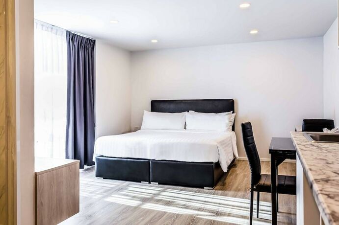 Imagen de la habitación del Hotel The Rizin Phratumnak. Foto 13