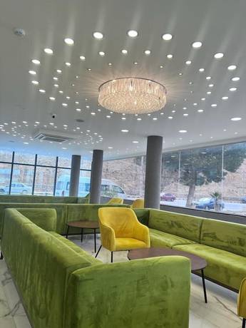 Imagen de los interiores del Hotel The Rns. Foto 16