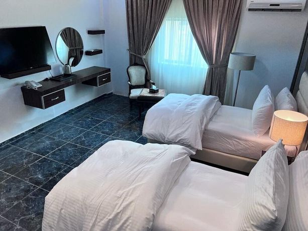 Imagen de la habitación del Hotel The Rns. Foto 1
