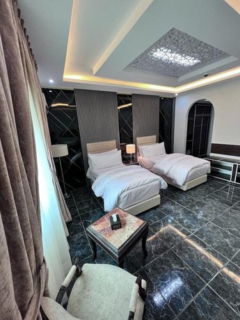 Imagen de la habitación del Hotel The Rns. Foto 2