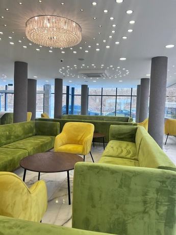 Imagen de los interiores del Hotel The Rns. Foto 18