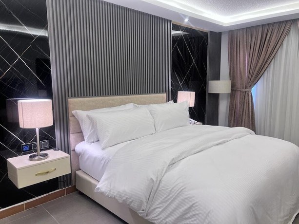 Imagen de la habitación del Hotel The Rns. Foto 3