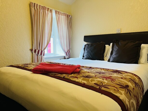 Imagen de la habitación del Hotel The Roadhouse. Foto 10