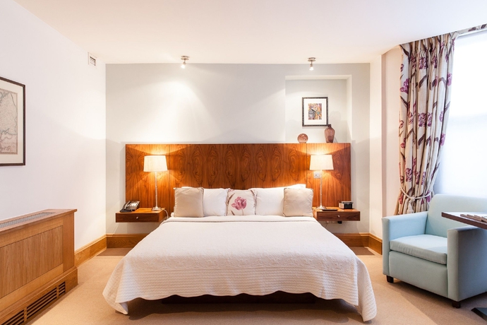 Imagen de la habitación del Hotel The Rockwell. Foto 11