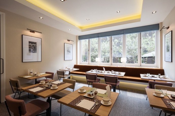 Imagen del bar/restaurante del Hotel The Rockwell. Foto 3