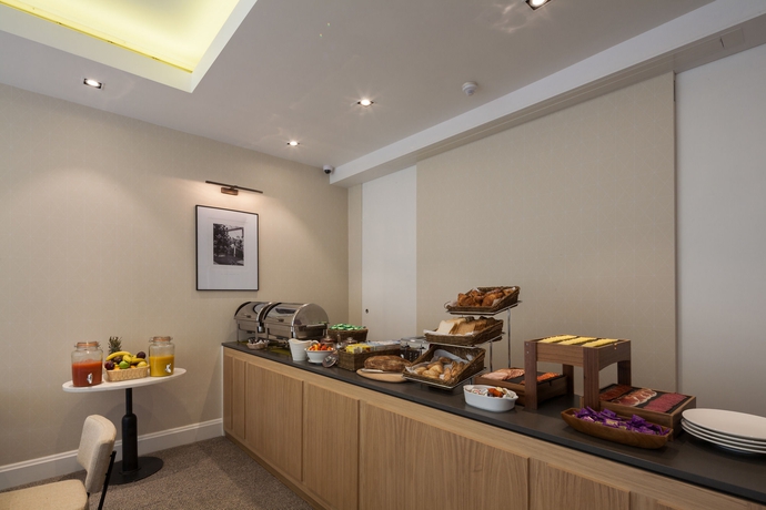 Imagen del bar/restaurante del Hotel The Rockwell. Foto 5