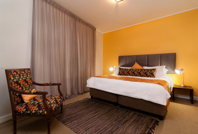 Imagen de la habitación del Hotel The Rockwell Luxury Suites. Foto 10