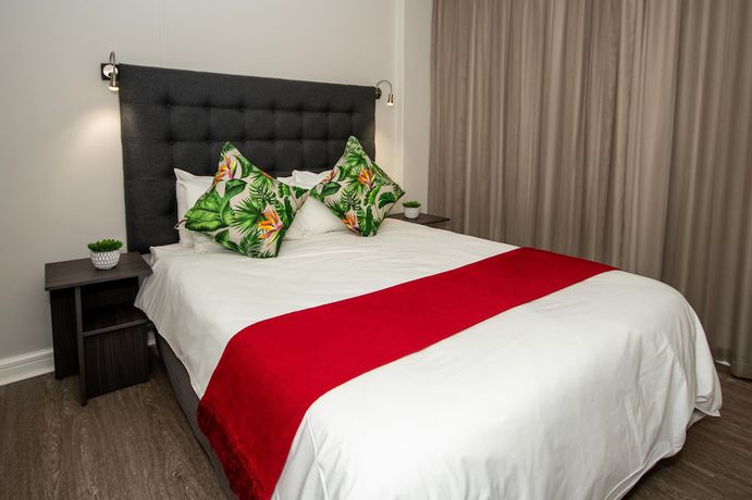 Imagen de la habitación del Hotel The Rockwell Luxury Suites. Foto 11