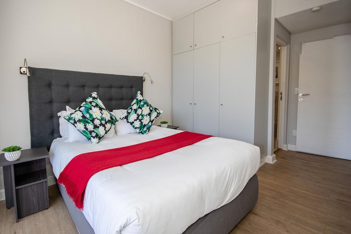 Imagen de la habitación del Hotel The Rockwell Luxury Suites. Foto 13