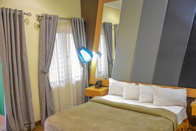 Imagen de la habitación del Hotel The Rodinia. Foto 9