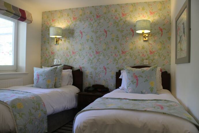 Imagen de la habitación del Hotel The Roman Camp Inn. Foto 12