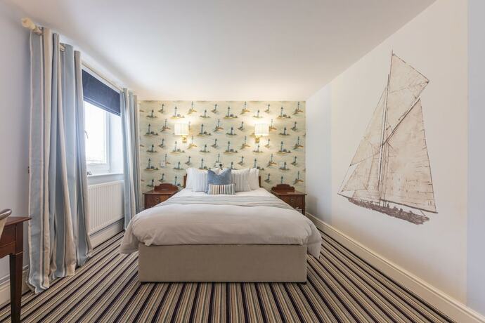 Imagen de la habitación del Hotel The Roman Camp Inn. Foto 17