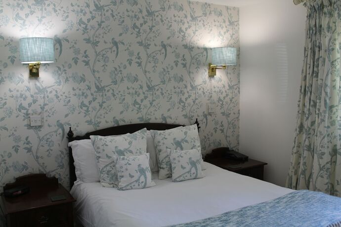 Imagen de la habitación del Hotel The Roman Camp Inn. Foto 19