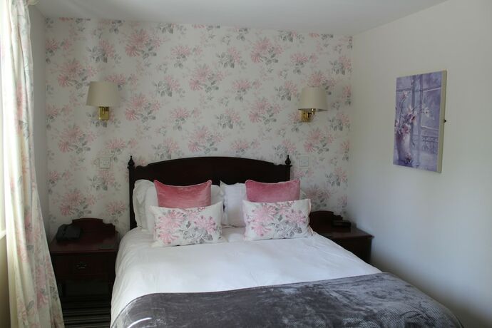Imagen de la habitación del Hotel The Roman Camp Inn. Foto 20