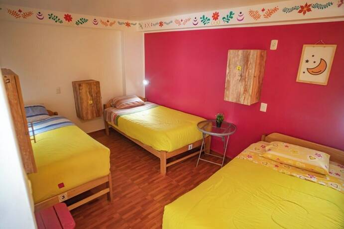 Imagen de la habitación del Hotel The Rooftop Hostel. Foto 16
