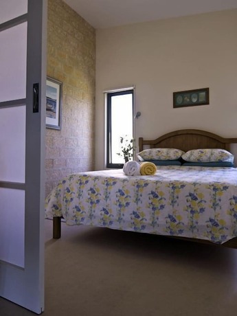 Imagen de la habitación del Hotel The Rookery At Christmas Cove. Foto 8
