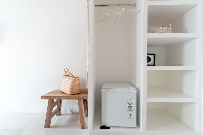 Imagen de la habitación del Hotel The Room Padang-Padang. Foto 15