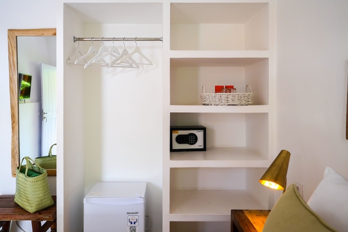 Imagen de la habitación del Hotel The Room Padang-Padang. Foto 18