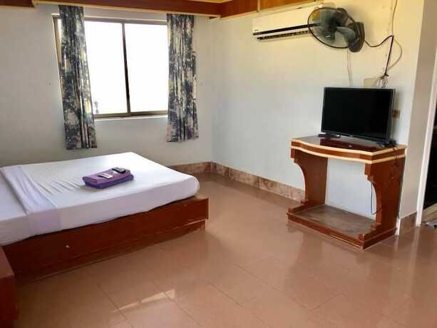 Imagen de la habitación del Hotel The Room Padangbesar. Foto 10