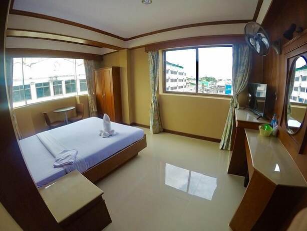 Imagen de la habitación del Hotel The Room Padangbesar. Foto 11