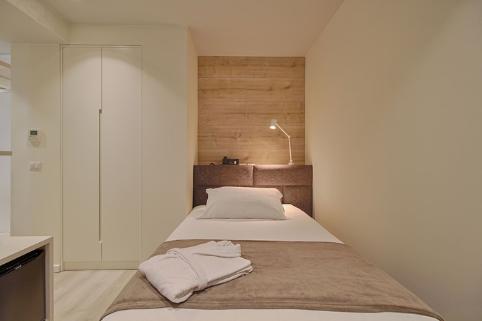 Imagen de la habitación del Hotel The Rooms Apartments Tirana. Foto 10