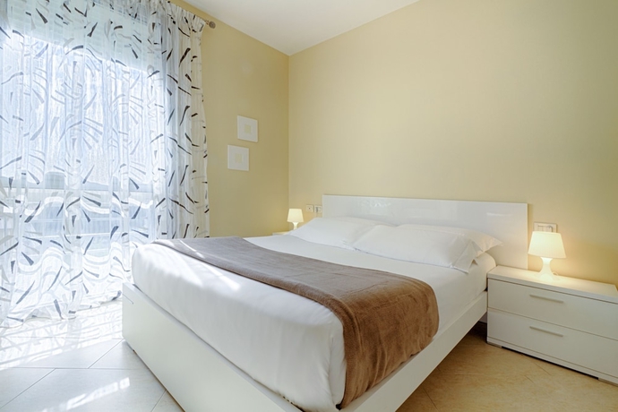 Imagen de la habitación del Hotel The Rooms Apartments Tirana. Foto 15