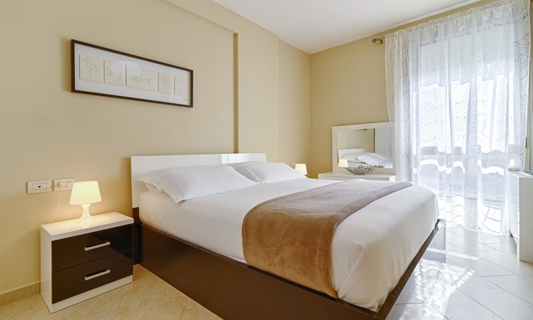 Imagen de la habitación del Hotel The Rooms Apartments Tirana. Foto 16