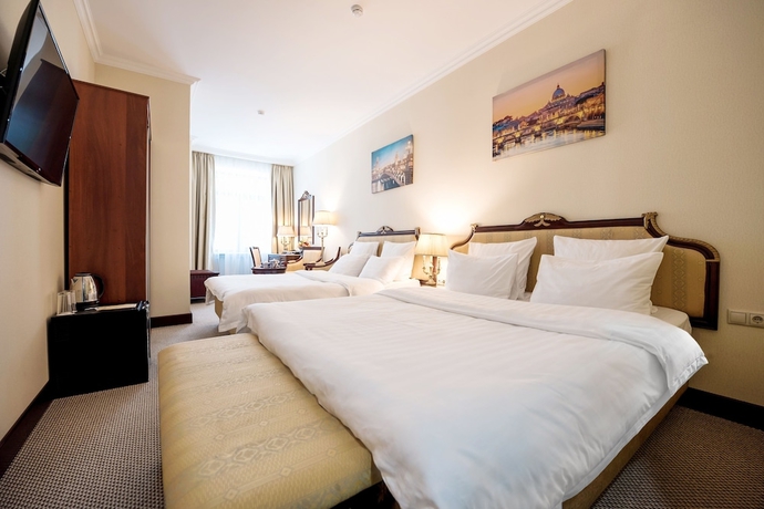 Imagen de la habitación del Hotel The Rooms Boutique. Foto 8