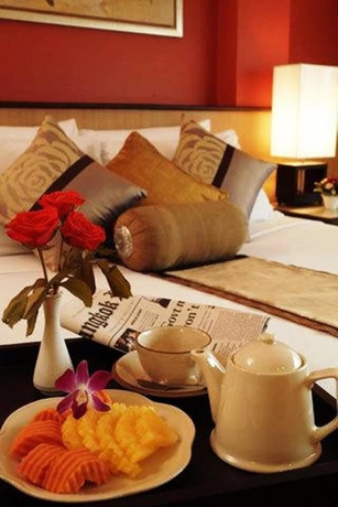 Imagen de la habitación del Hotel The Rose Bangkok. Foto 10