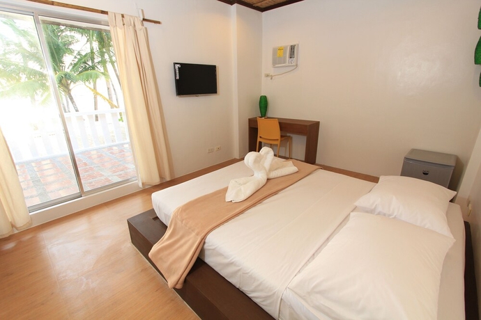 Imagen de la habitación del Hotel The Rose Pike At Boracay. Foto 2