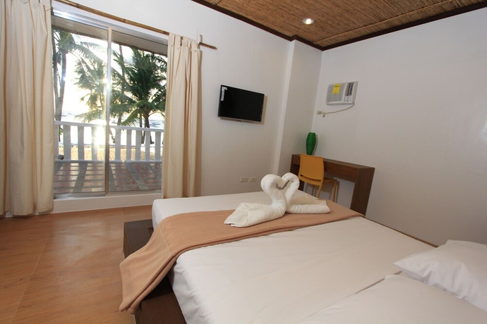 Imagen de la habitación del Hotel The Rose Pike At Boracay. Foto 3
