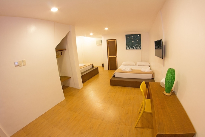 Imagen de la habitación del Hotel The Rose Pike At Boracay. Foto 6