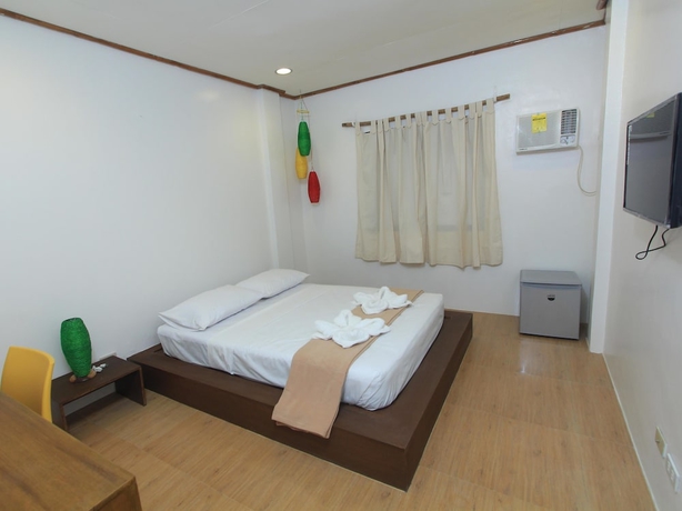 Imagen de la habitación del Hotel The Rose Pike At Boracay. Foto 10