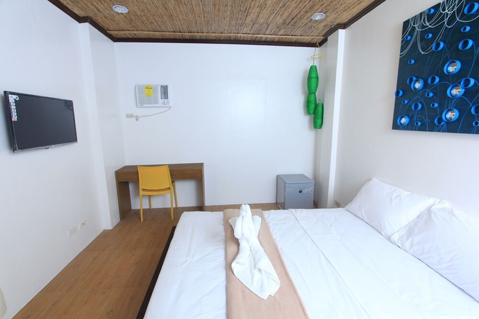 Imagen de la habitación del Hotel The Rose Pike At Boracay. Foto 11