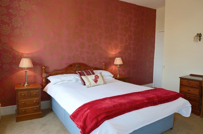 Imagen de la habitación del Hotel The Rose and Crown. Foto 11