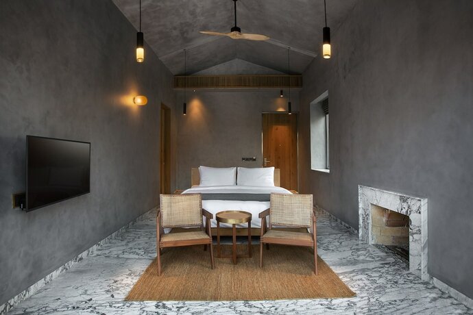 Imagen de la habitación del Hotel The Roseate Ganges Rishikesh. Foto 17