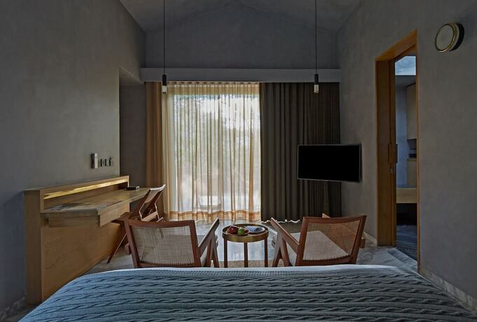 Imagen de la habitación del Hotel The Roseate Ganges Rishikesh. Foto 19