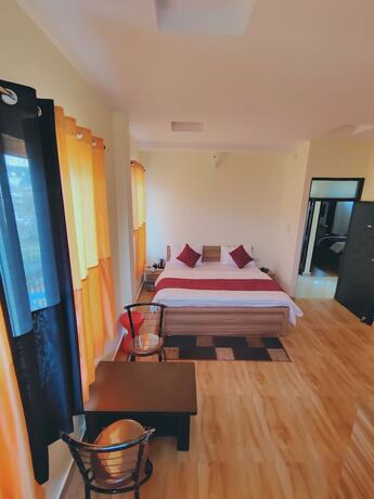 Imagen de la habitación del Hotel The Rosemary. Foto 17