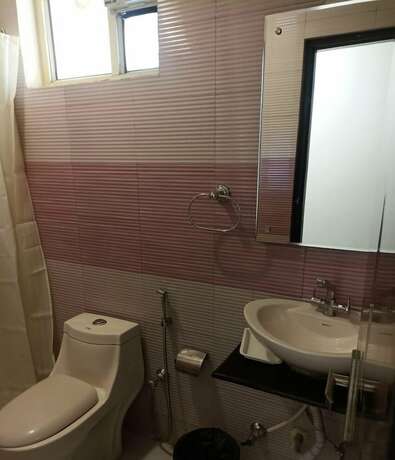 Imagen de la habitación del Hotel The Rosemary. Foto 19