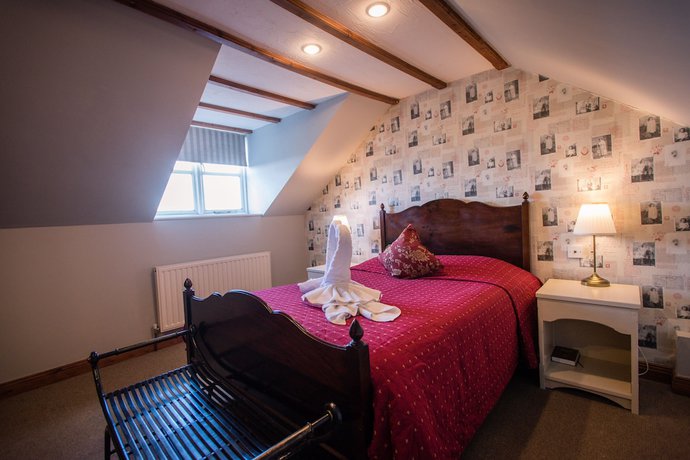 Imagen de la habitación del Hotel The Royal Arms. Foto 9