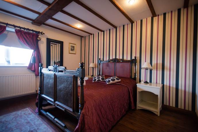 Imagen de la habitación del Hotel The Royal Arms. Foto 11