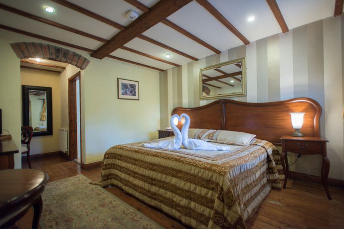 Imagen de la habitación del Hotel The Royal Arms. Foto 14