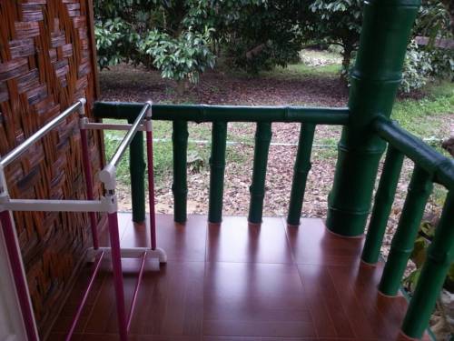 Imagen de la habitación del Hotel The Royal Bamboo Lodge. Foto 11