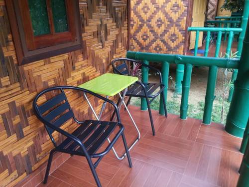 Imagen de la habitación del Hotel The Royal Bamboo Lodge. Foto 12